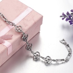 Kvalitets- Og Kvantitetssikret Platinbelagt Titanarmbånd Med Diamanter Til Kvinder