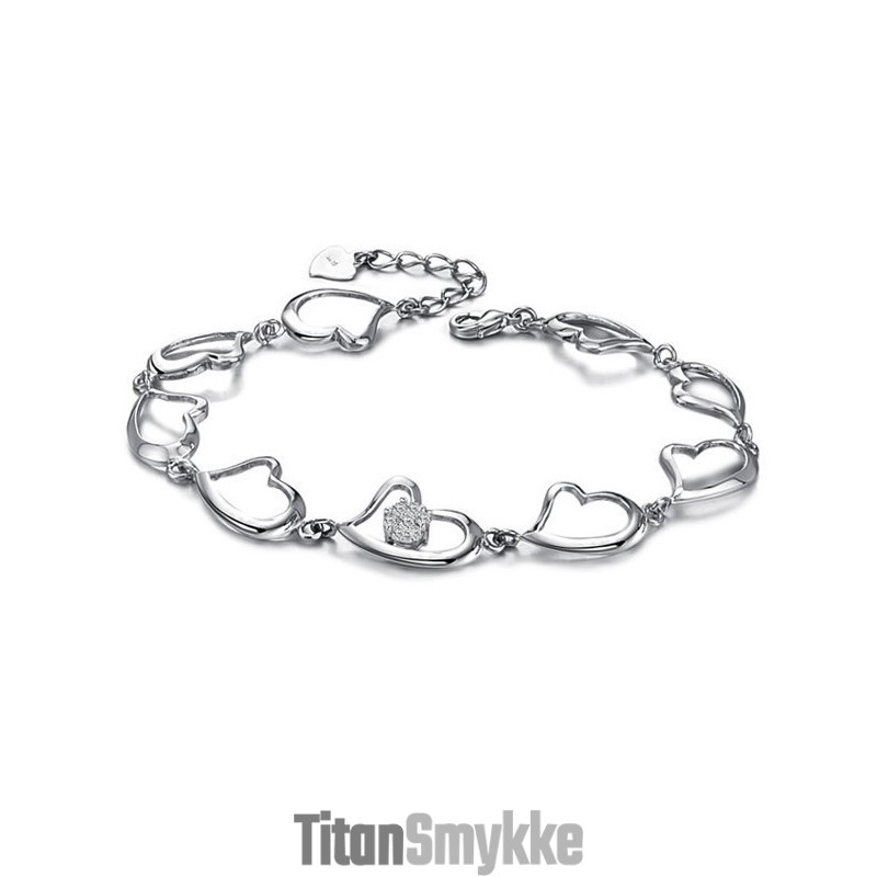 Kvalitets- Og Kvantitetsgaranteret Damearmbånd Med Og Diamanter I Titanium