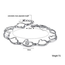 Kvalitets- Og Kvantitetsgaranteret Damearmbånd Med Og Diamanter I Titanium