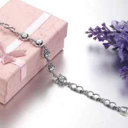 Kvalitets- Og Kvantitetssikret Kvindelig Kløverformet Platinbelagt Titanarmbånd